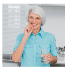 Older Woman takng tablets