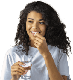 Stock_Woman taking tablet